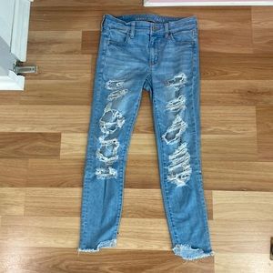 American Eagle ripped skinny jeans.